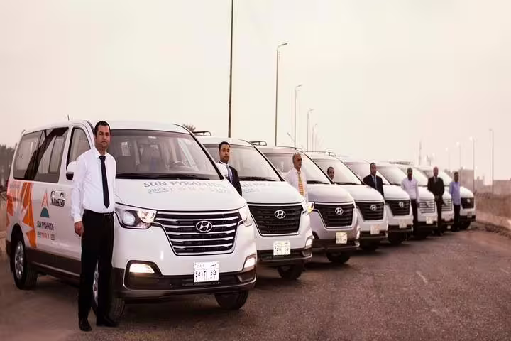 Line of Hyundai minibuses with chauffeurs for Sharm El Sheikh to Taba private transfer in South Sinai