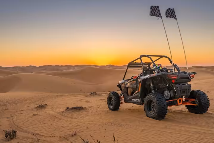 Private car buggy at sunset on Sinai Desert dunes, Sharm El Sheikh adventure tour with thrilling off-road ride