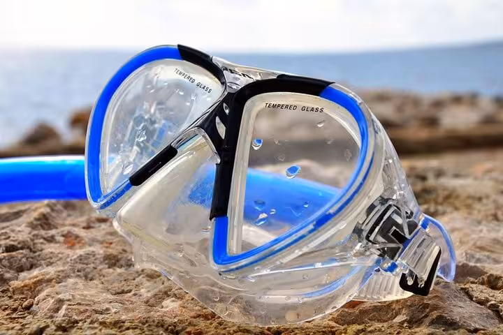 Snorkeling mask on the shore for Blue Hole Dahab stop on Sharm El-Sheikh Jeep Adventure day trip