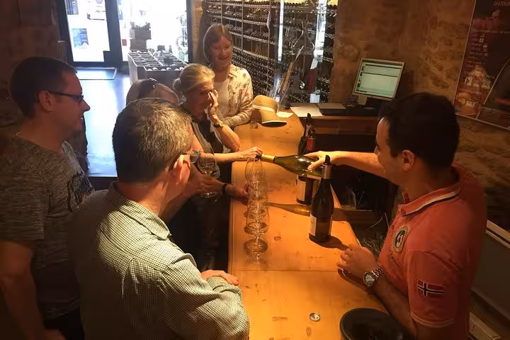 Sommelier-led wine tasting at a cozy cellar bar, part of a 3-day heritage, wines and gastronomy tour
