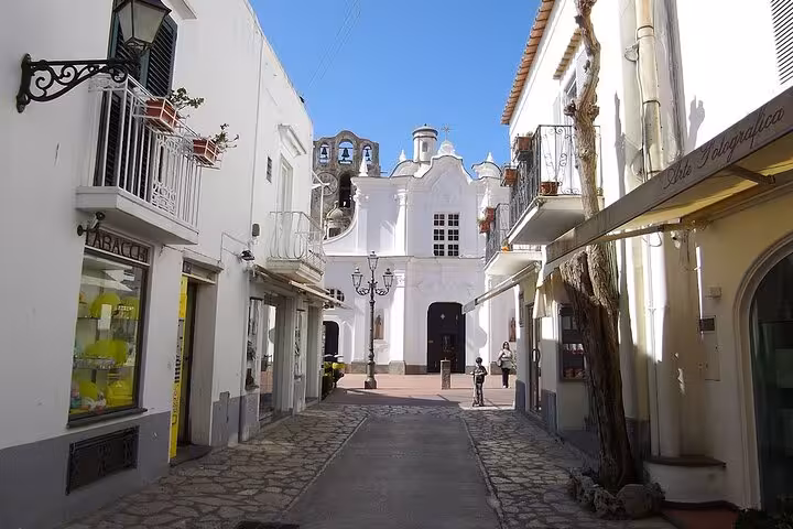 Charming narrow street leading to a historic church in the heart of Sorrento, perfect for cultural exploration.