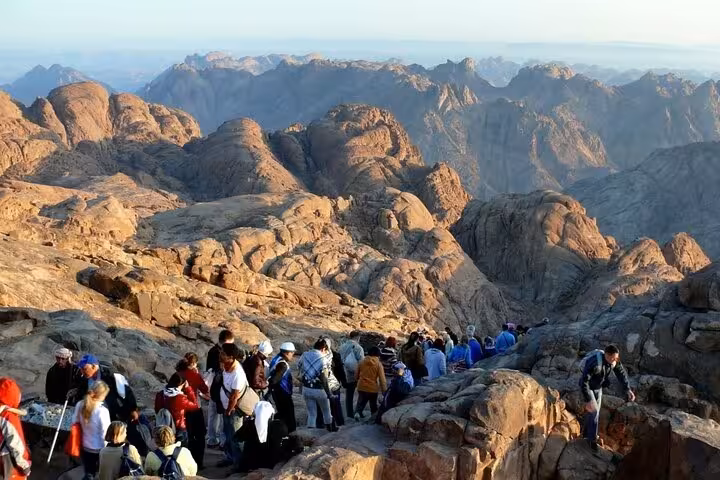 Sunrise view over Sinai mountains with climbers on the Summit of Mount Sinai from Sharm El Sheikh