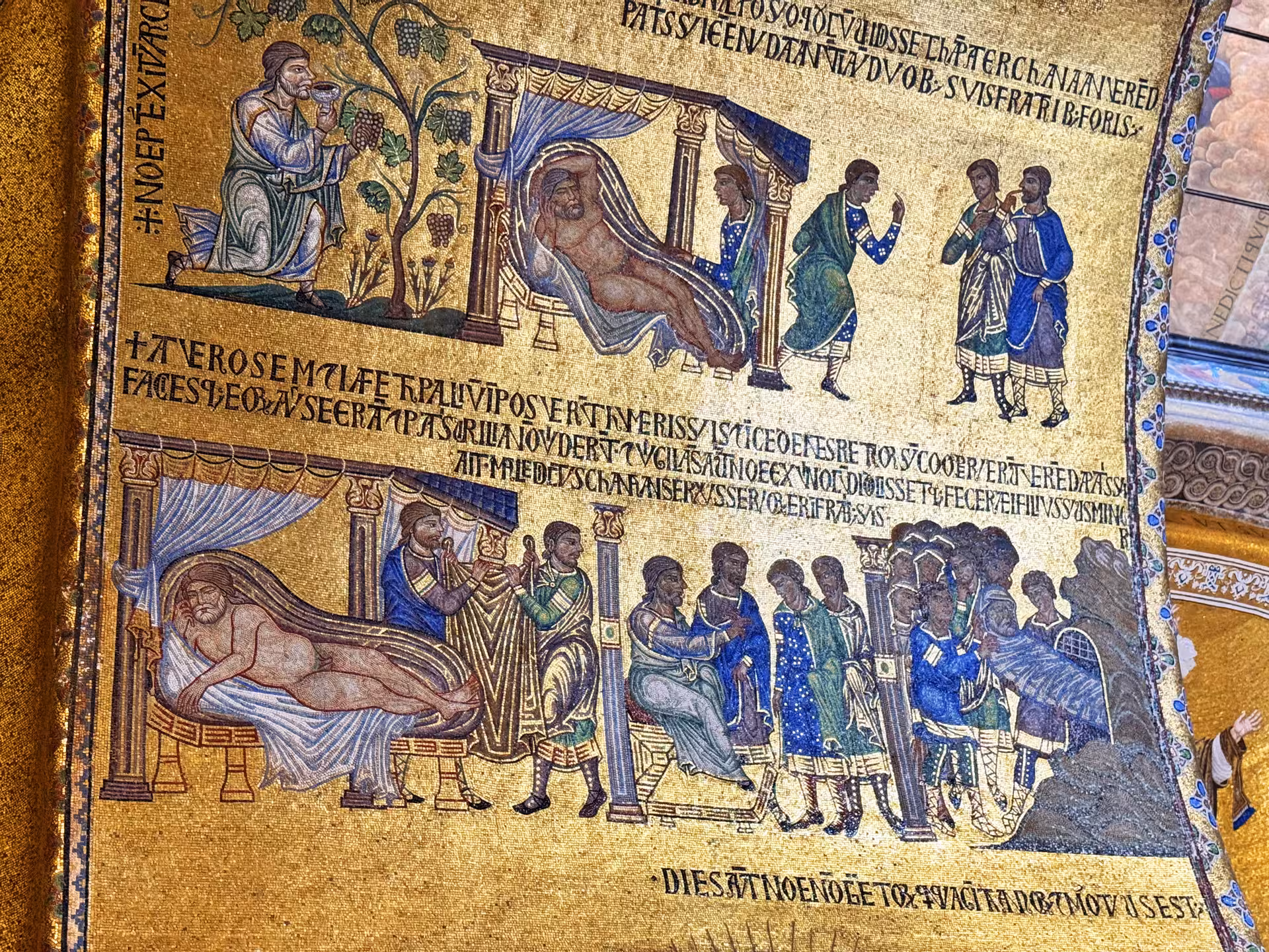 Intricate golden mosaics depicting biblical scenes inside St. Mark's Basilica, a highlight of the Venice guided tour.