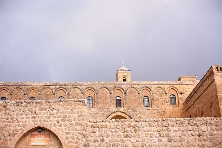 Stone monastery facade in southeastern Turkey, visited on an all-inclusive private 10-day Mesopotamia tour