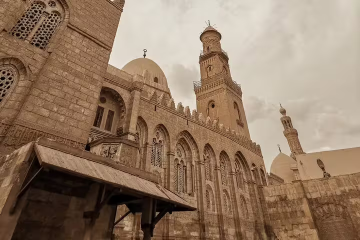 Facade of Sultan Hassan Mosque and minaret in Islamic Cairo, Egypt, on a full-day Islamic and Christian tour