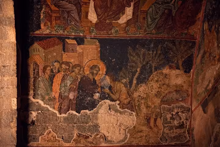 Ancient wall fresco scene at Sumela Monastery near Trabzon, a highlight of the all-inclusive private 2-day tour