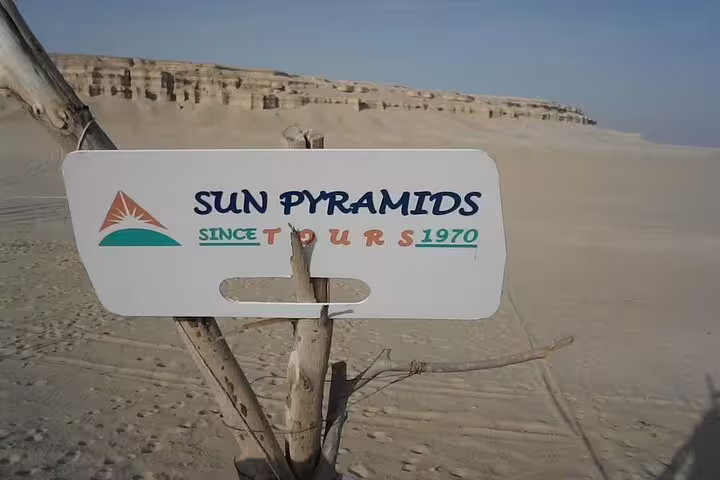 Sun Pyramids Tours sign in Bahariya Oasis desert, gateway to the 3 days 2 nights White Desert trip