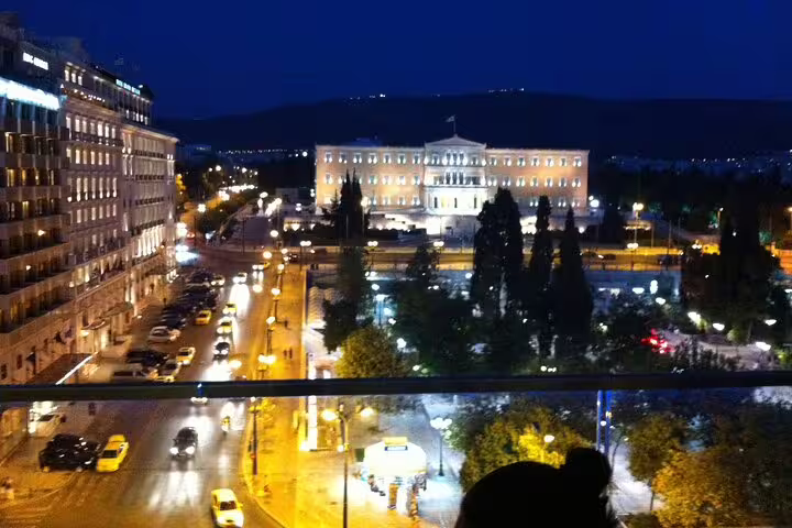 Night view of Syntagma Square and Hellenic Parliament, a key stop on a 2-hour private Athens express tour