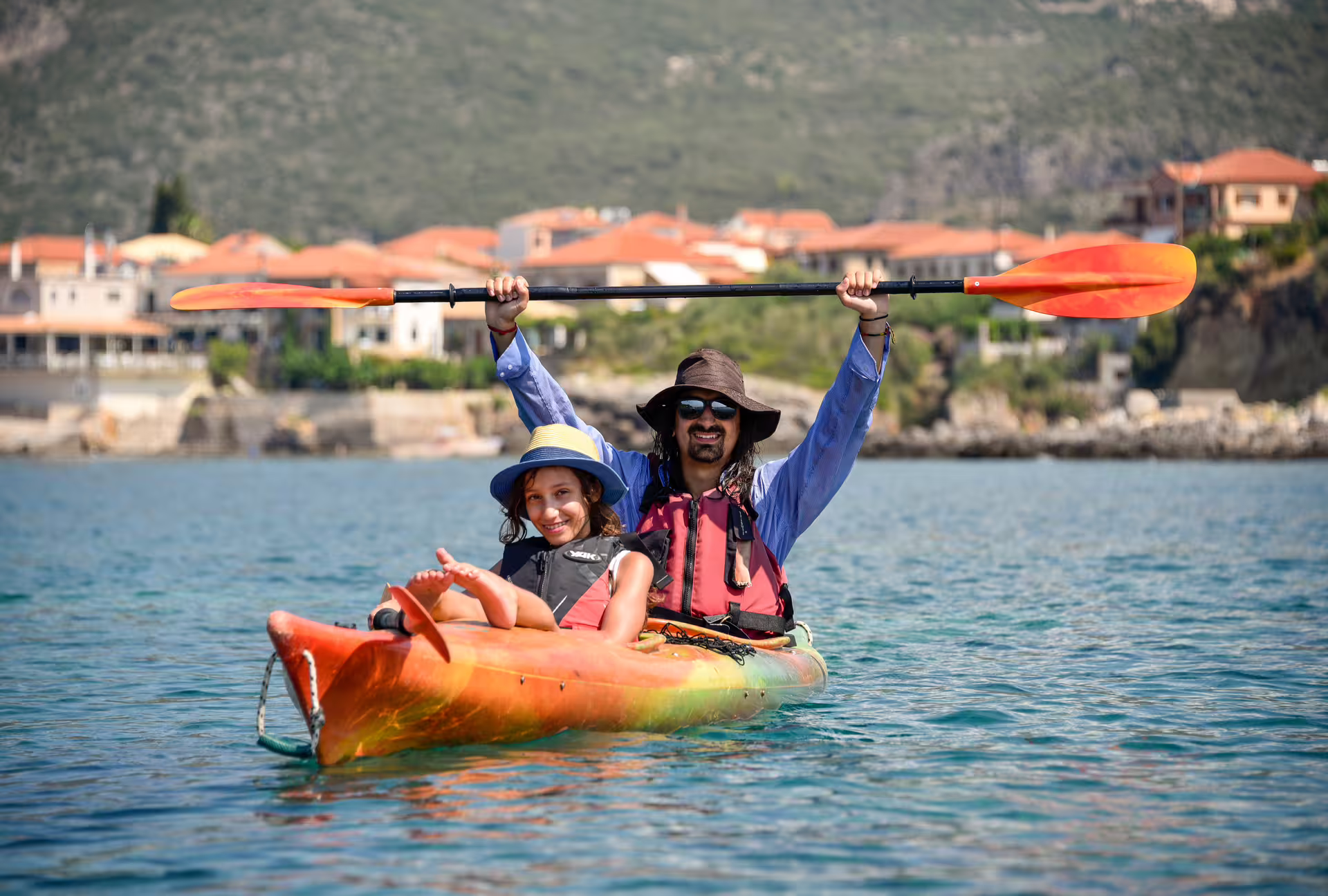 Tandem sea kayak near Kardamyli with village views on the Sea Kayak Kardamyli and Stoupa tour, Messinia Greece