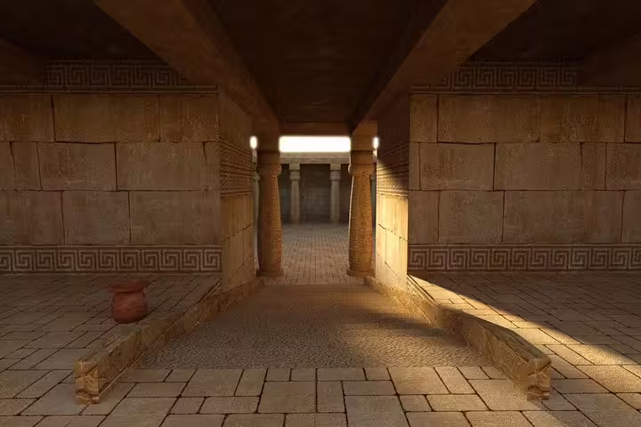 Ancient stone corridor with columns at Tell el-Amarna site, featured on a private day tour from Cairo
