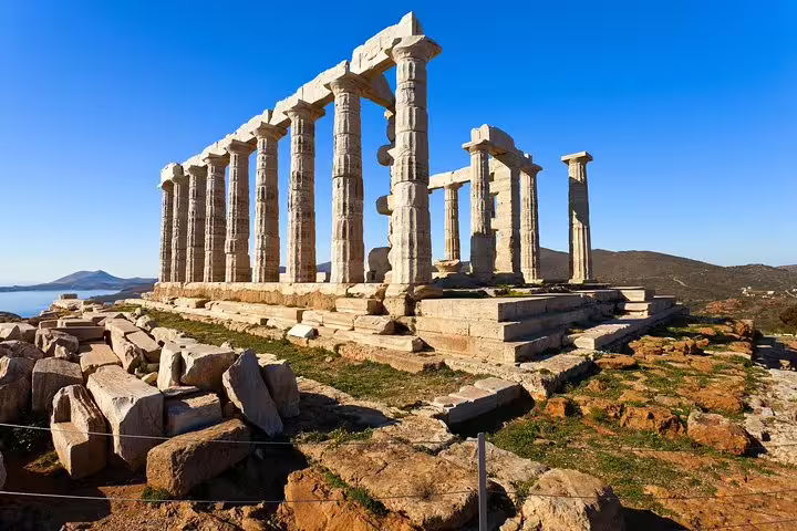 Temple of Poseidon at Cape Sounio on a private Athens day tour, scenic ruins above the Aegean Sea