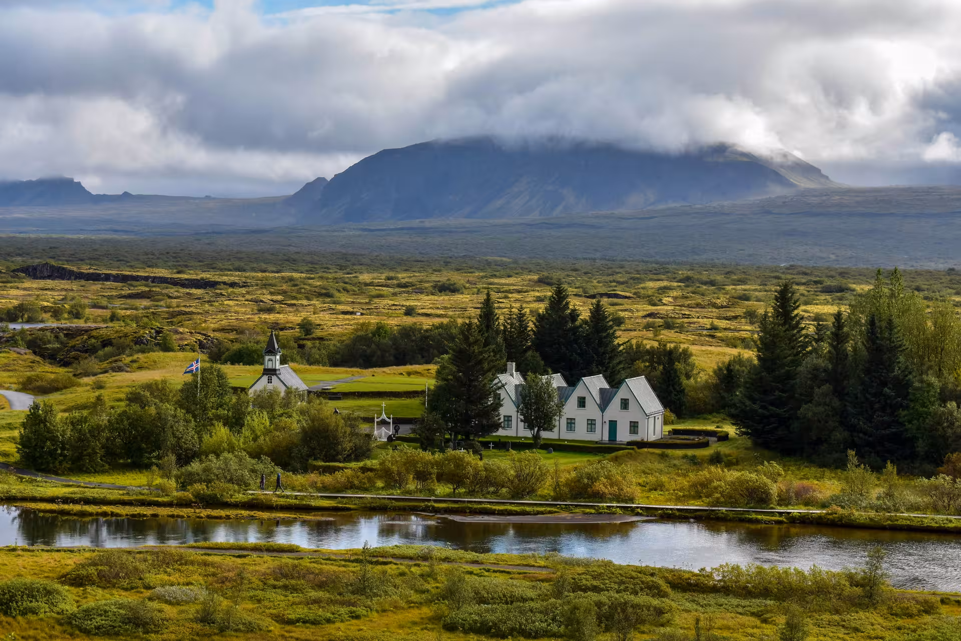 Thingvellir National Park valley with Icelandic church and river on Golden Circle private tour 1–6 passengers