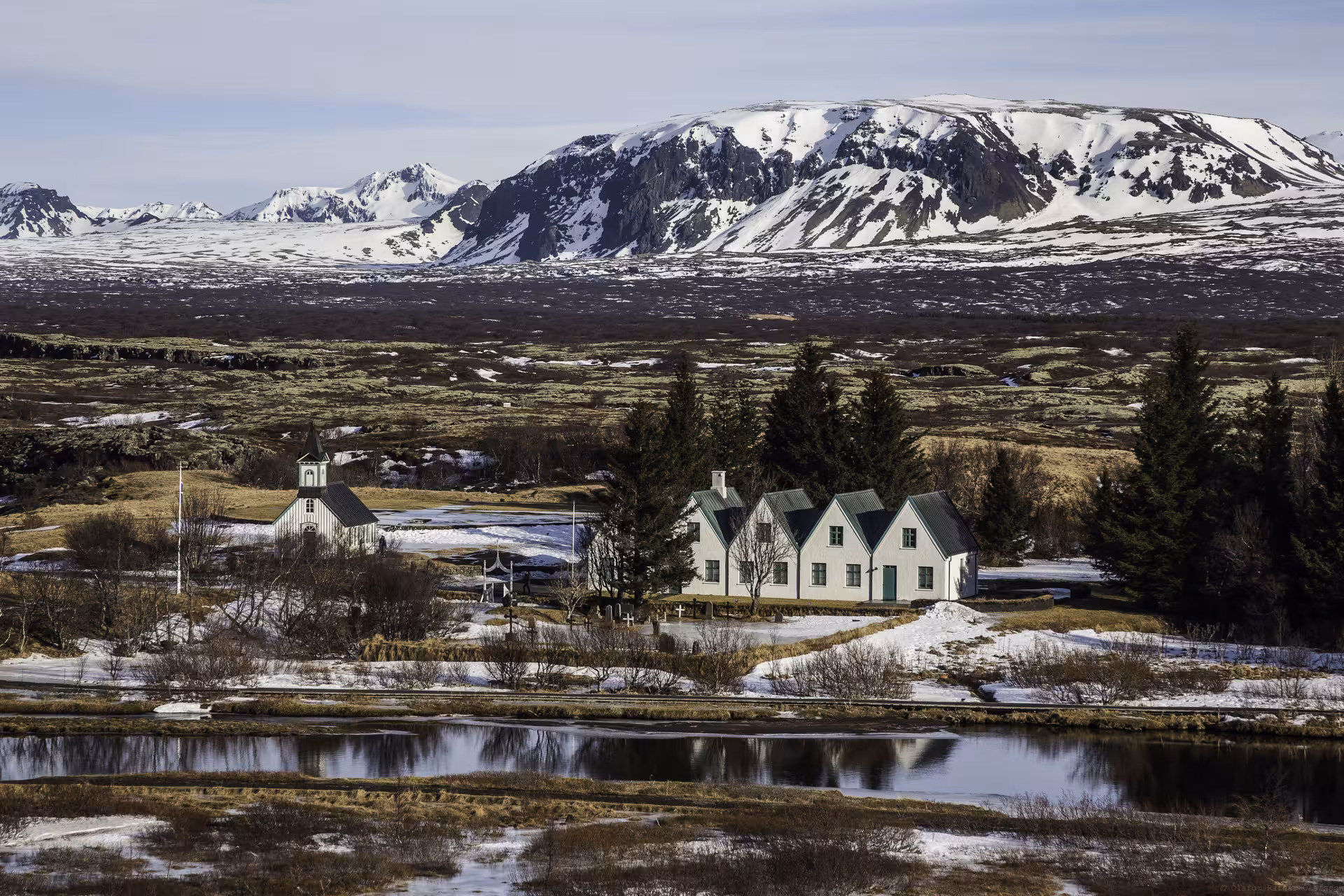 Scenic view of Þingvellir National Park's snowy landscape, featured in the 5-Day Northern Lights Hunt & Glacier Lagoon Tour.