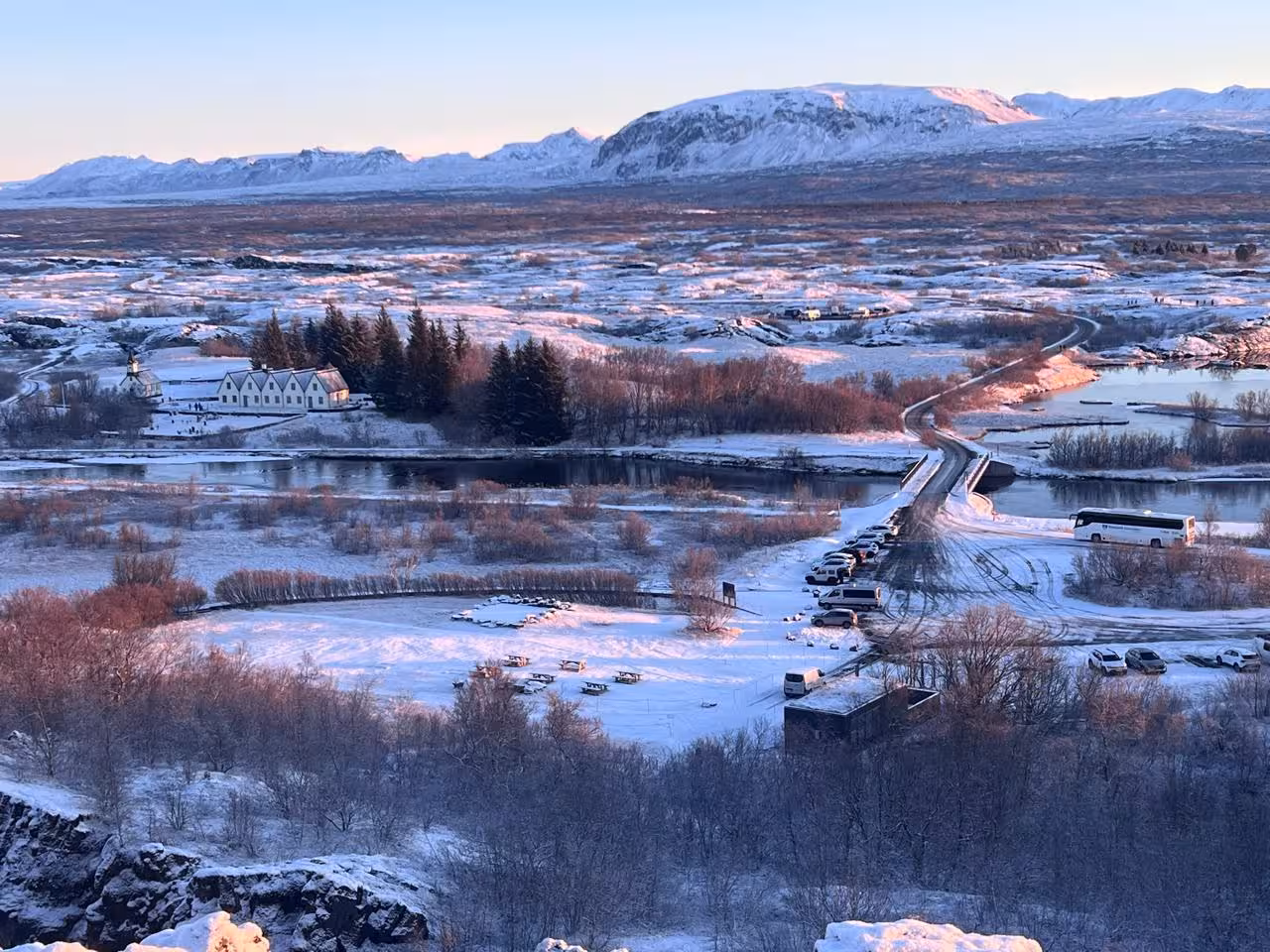 Winter view of Thingvellir National Park on Golden Circle tour from Reykjavik, snowy valley and lake