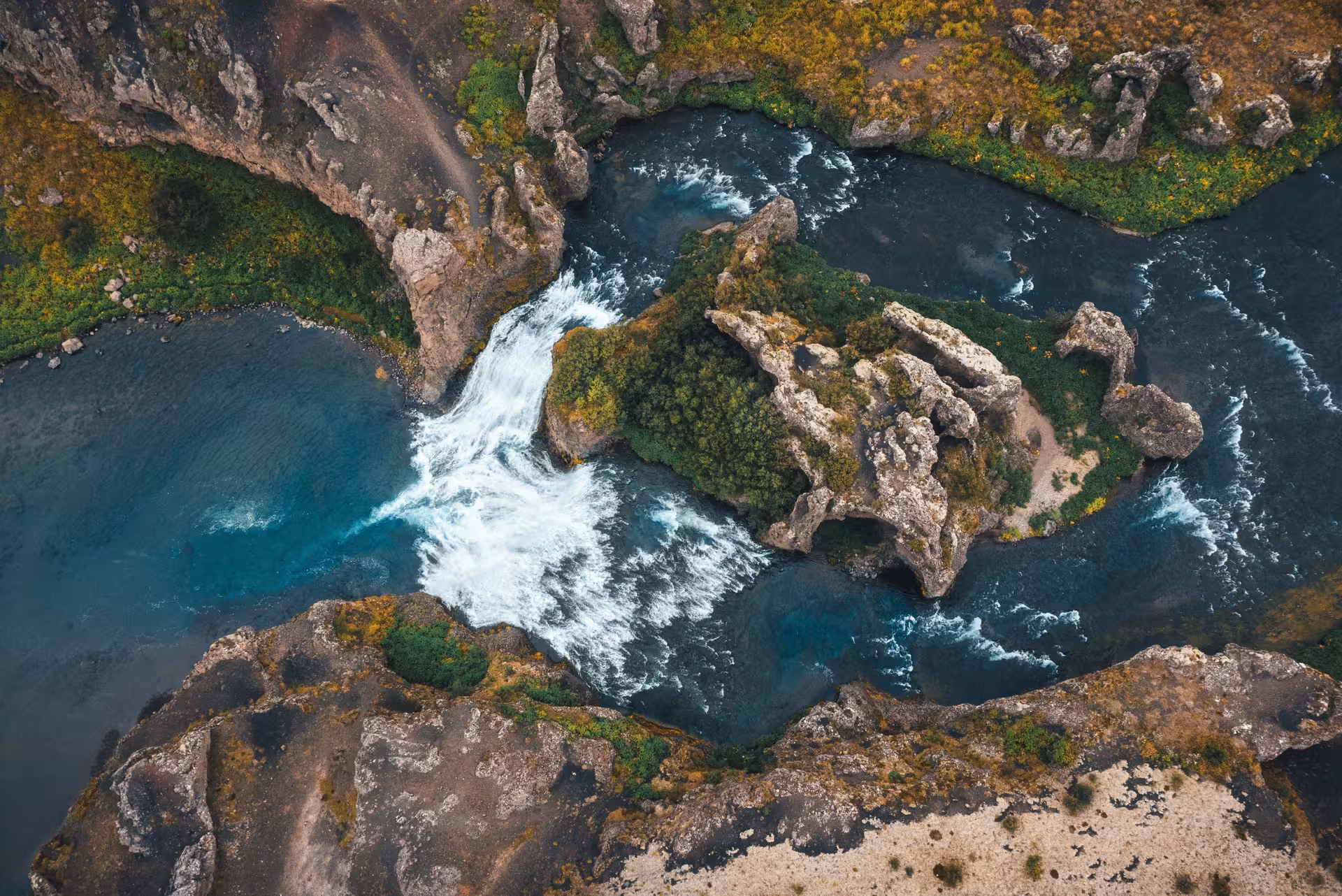 Aerial view of waterfall and basalt rocks on Private Þjórsárdalur Valley Tour in Iceland Highlands
