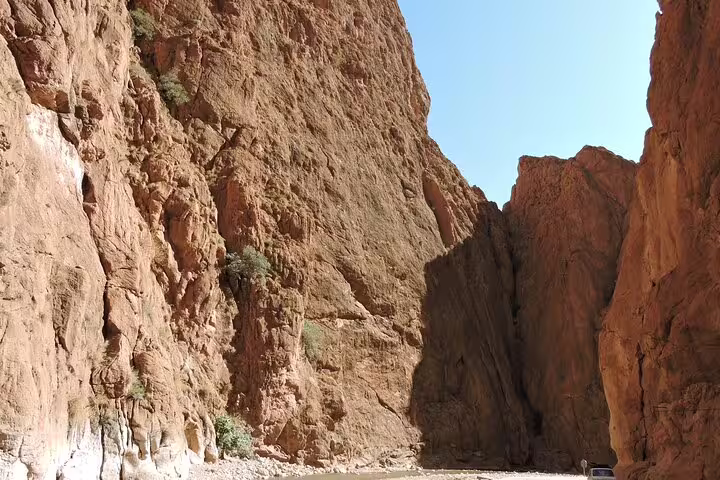 Towering Todra Gorge canyon walls on the route from Marrakech to Merzouga on a 3-day private desert tour