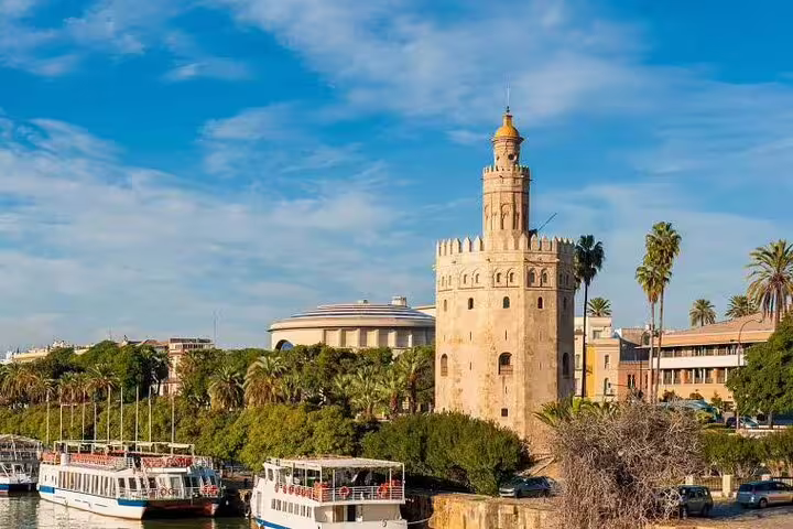 Torre del Oro by the Guadalquivir River in Seville, landmark stop on a self-guided e-scavenger hunt tour