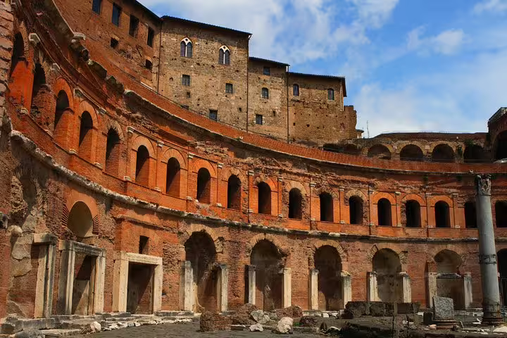 Close-up of the curved brick arcades of Trajan’s Markets in Rome, explored on an expert-led Imperial Forum private tour