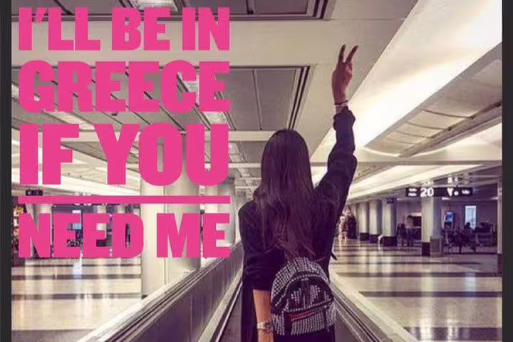 Traveler in airport terminal signaling for meet-and-greet airport pickup service with private transfer assistance