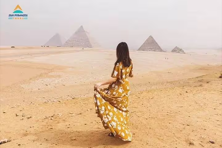 Traveler at Giza Pyramids on Cairo day trip from Hurghada, part of 2-day Cairo and Luxor tour