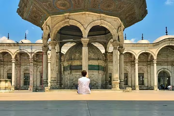 Traveler at Mosque of Muhammad Ali courtyard on Cairo National Museum to Citadel and bazaars tour