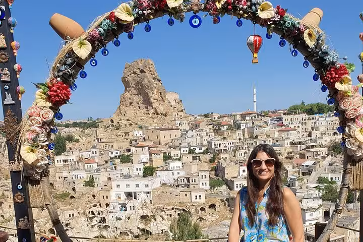 Traveler at Uchisar Castle viewpoint in Cappadocia, Istanbul hotel and roundtrip flight included tour