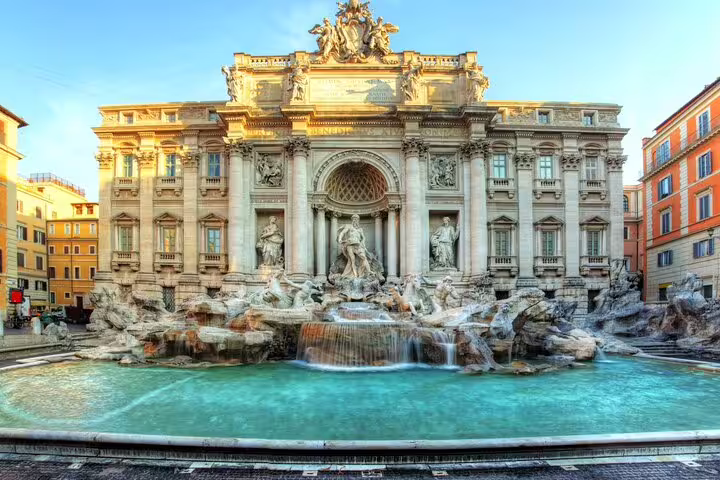 Trevi Fountain in Rome at golden hour, key stop on Spanish Steps GPS audio walking tour route