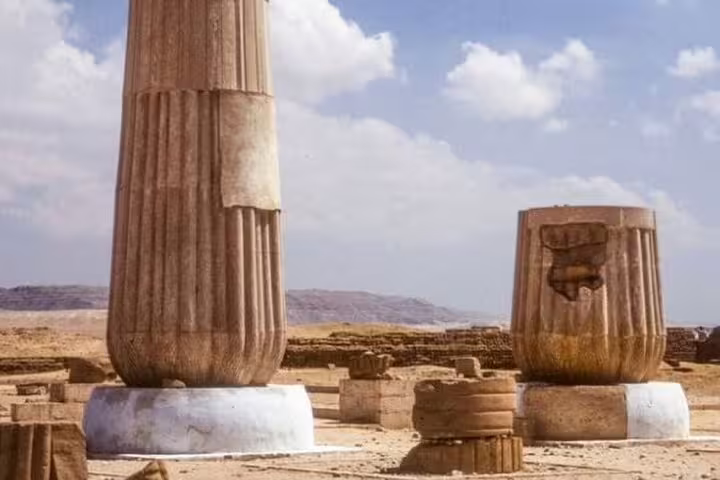 Ancient columns at Tuna el-Gebel ruins in El Minya, visited on a private day tour from Cairo by car