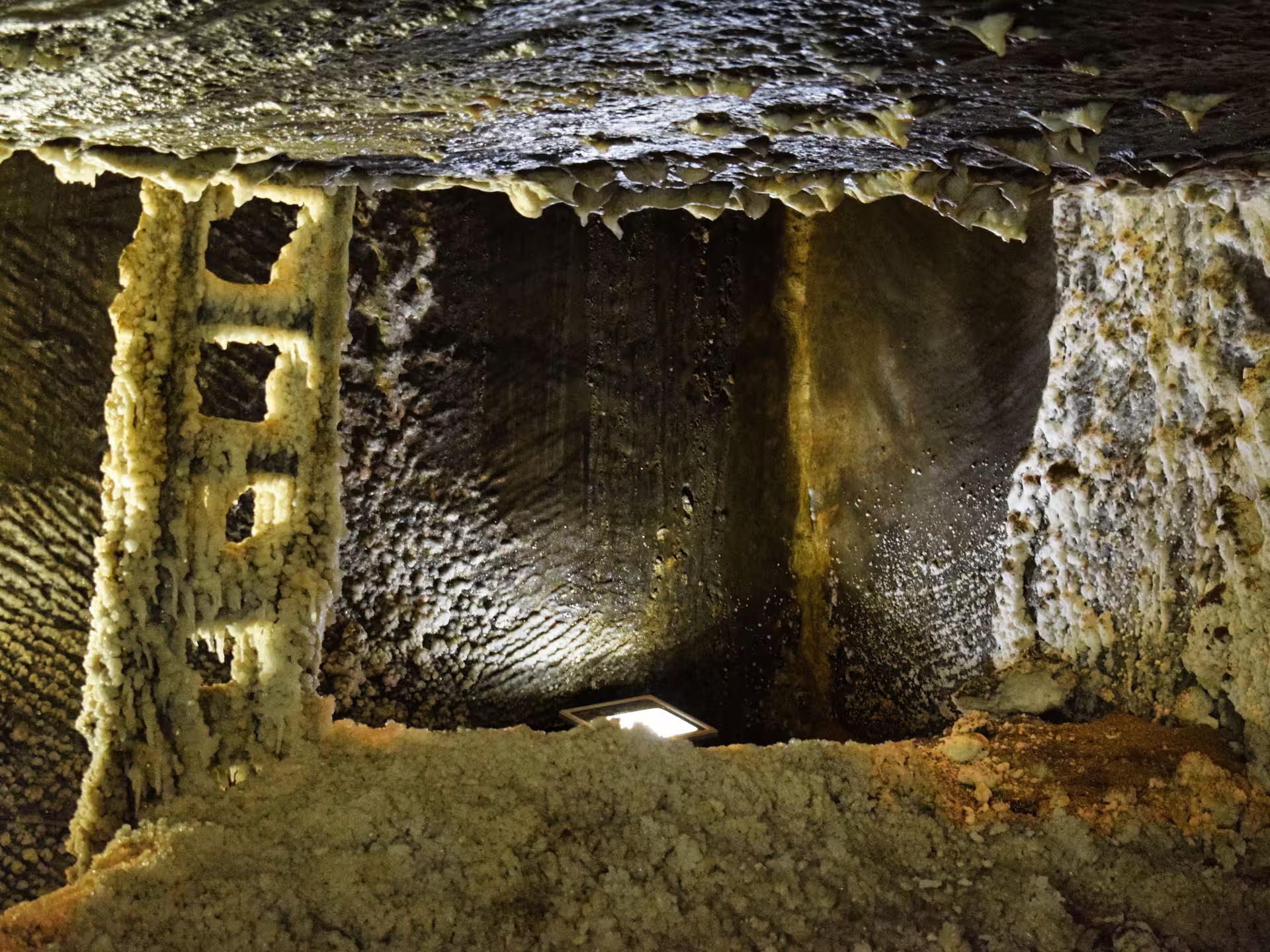 Close-up of ancient salt-encrusted walls and tunnels inside Turda Salt Mine on a guided tour from Cluj