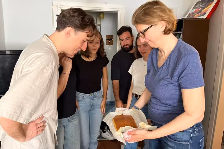 Guests learn to pour homemade Turkish dessert tray in hands-on Turkish coffee and sweets cooking class