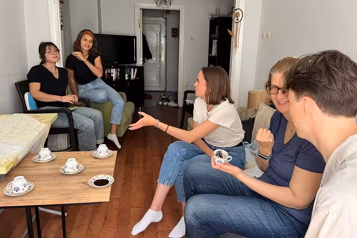 Guests chat over freshly brewed Turkish coffee during an Istanbul Turkish desserts and coffee workshop