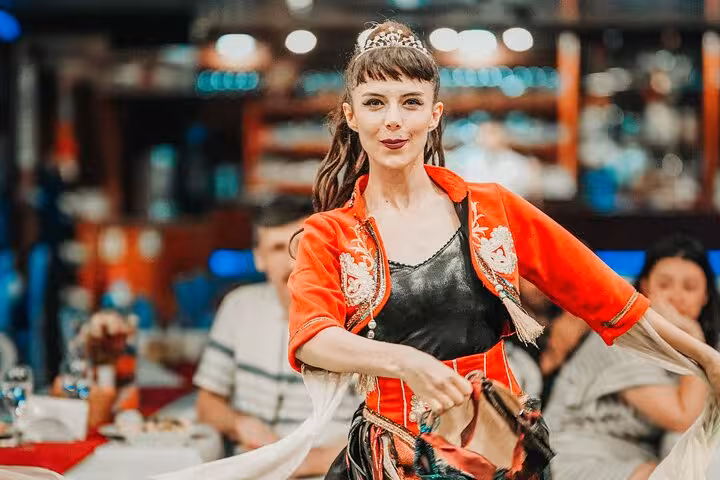 Traditional Turkish dancer performs onboard Istanbul New Year’s Eve Bosphorus party cruise dinner show