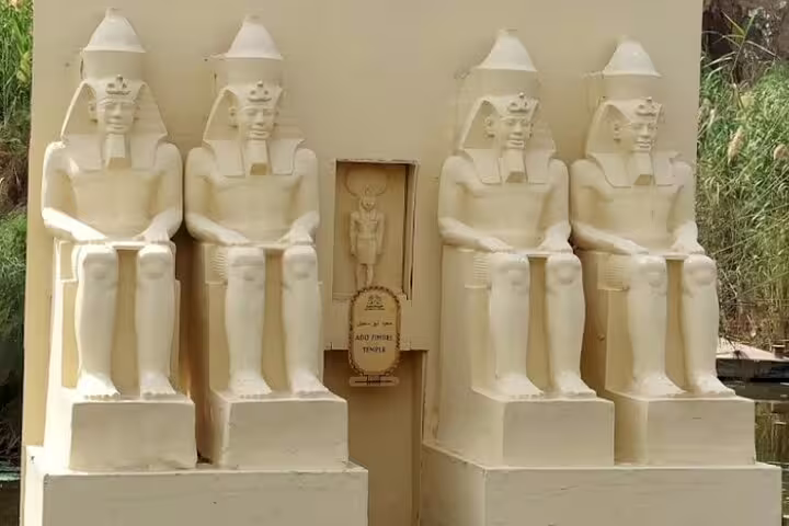 Twin pharaoh statues at Pharaonic Village Cairo on a private tour, showcasing ancient Egypt replicas