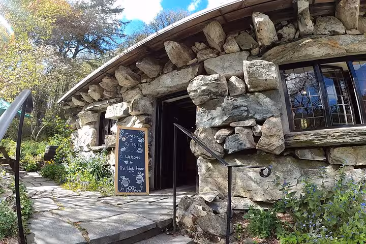 Ty Hyll Ugly House stone cottage at Fairy Glen, scenic stop on Portmeirion, Castles and Snowdonia tour