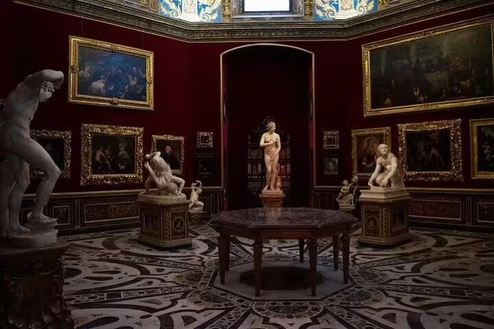 Opulent sculpture and painting gallery inside Florence’s Uffizi Museum, featured on the Uffizi and Accademia highlights tour