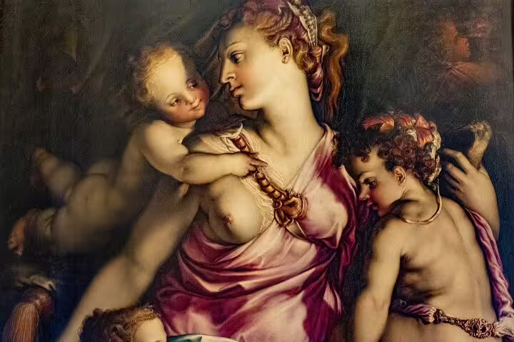 Renaissance painting of a woman with cherubs inside the Uffizi Gallery, highlighted on a Florence small group guided tour
