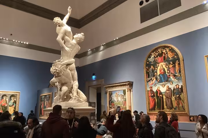 Explore the Uffizi Gallery's masterpieces, including iconic sculptures and Renaissance paintings on our guided tour.