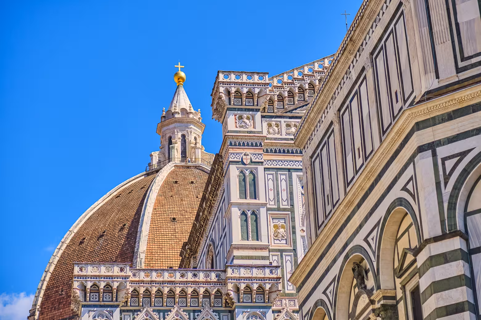 View of the Florence Cathedral's iconic dome, a highlight of the Uffizi Gallery and Vasari Corridor tour.