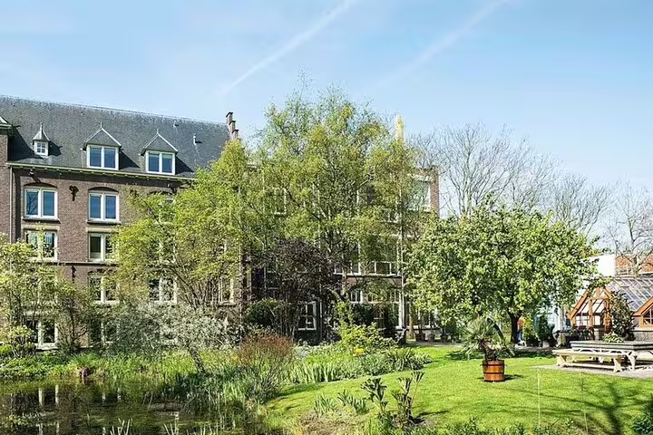 Peaceful garden courtyard in Utrecht on a private day trip from Amsterdam with a local guide