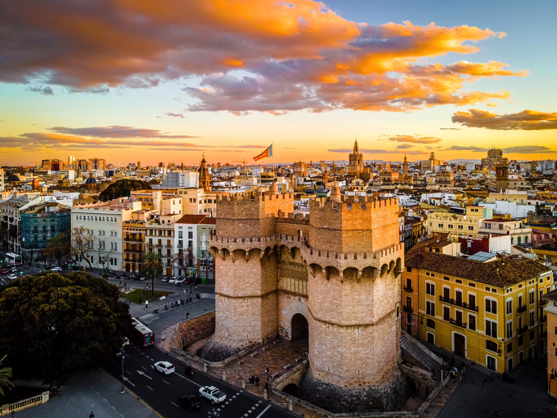Aerial view of Torres de Serranos at sunset, highlight on Valencia 1-day walking tour with multilingual audioguide