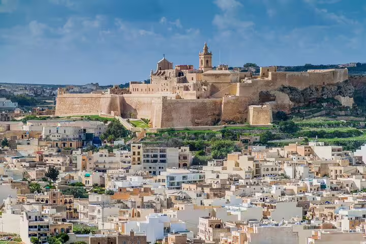 Panoramic view of Valletta’s fortified walls and skyline, a highlight on a half-day local sightseeing tour