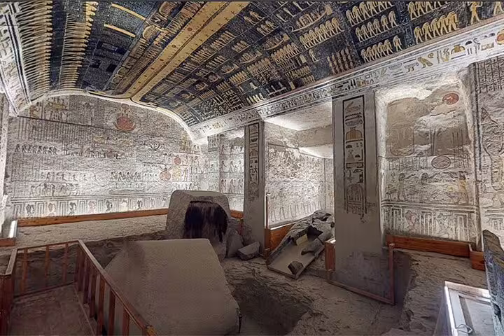 Ancient pharaoh tomb chamber with carved walls and starry ceiling, Valley of the Kings day trip from Hurghada