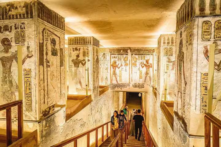 Valley of the Kings tomb corridor with ancient wall paintings on private day tour from Hurghada to Luxor