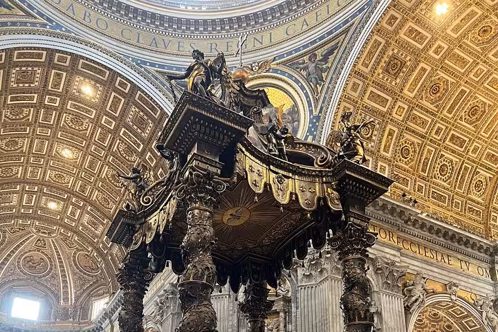 Intricate details of St. Peter's Basilica interior, highlighting ornate art and architecture.