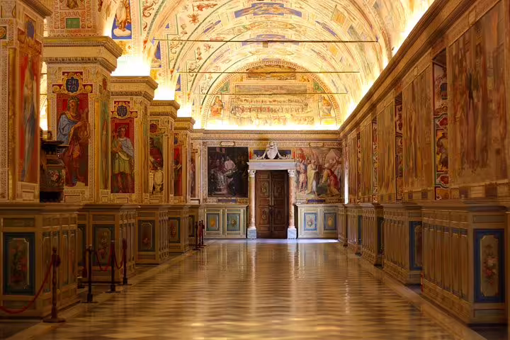 Ornate painted gallery and vaulted ceiling inside the Vatican Museums, visited on a private Rome Sistine Chapel guided tour