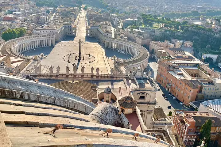 Panoramic view from St Peter’s Basilica dome over St Peter’s Square on Exclusive Vatican Museum Sistine Chapel fast track tour
