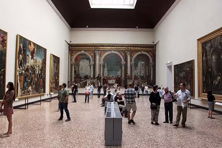 Visitors admire Renaissance masterpieces inside Venice’s Accademia Gallery, a highlight of the Dorsoduro private art tour