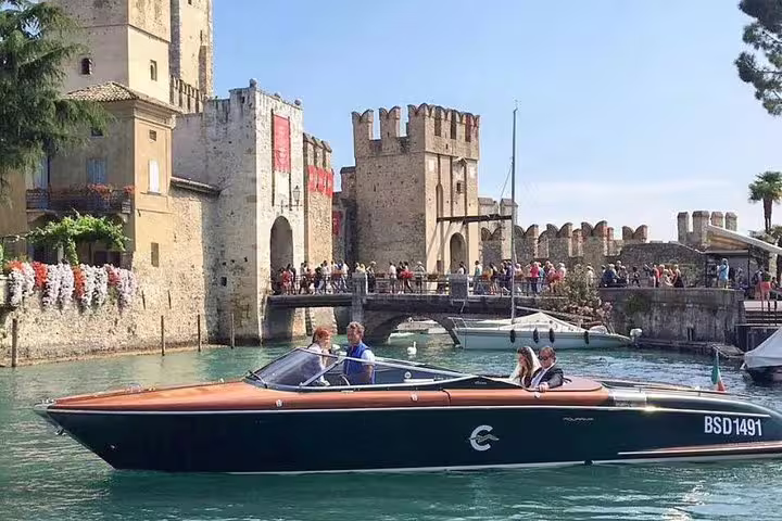 Enjoy a luxurious boat ride past historic castles on the Venice to Milano scenic transfer.