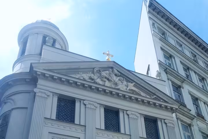Close-up of baroque church facade and dome in Vienna, a highlight on the 3-hour unknown historical tour