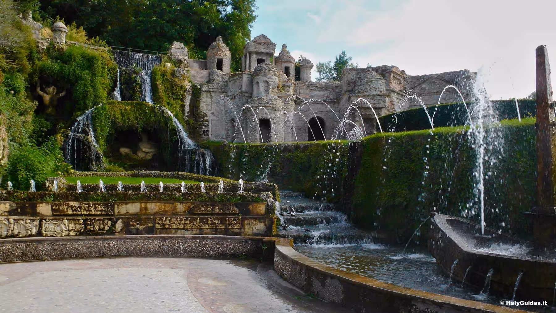 Experience Tivoli's Villa d'Este with its enchanting moss-covered fountains and historic architecture.